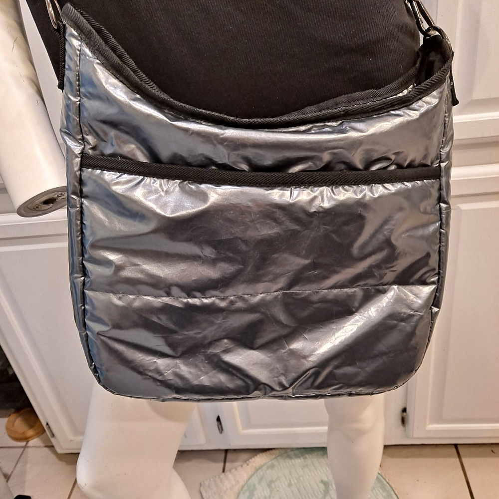 HAUTE SHORE Metallic Silver Featherweight Puffer Crossbody Bag
